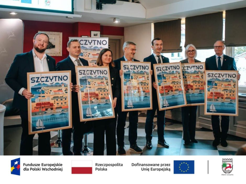 osoby trzymające ilustrację